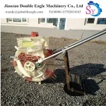 Easy to operate mini manual push roller type kidney beans dibble seeder/cotton seeding machine