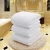 Import Factory wholesale custom hotel linen white towel thickened cotton beauty bath towel from China