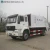 Import HOWO 160hp 7 Ton Compacted Garbage Truck Garbage Compactor Truck from China