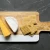 Import New design acacia wood paddle shape cheese board marble wood cutting board from China