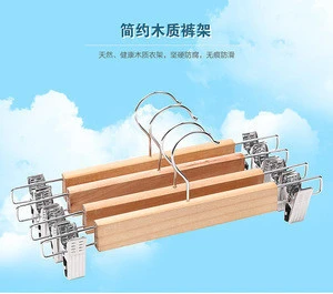 Nice quality Non-slip steel grip clips Wooden Hangers with Cushioned clamps for hanging pants skirt