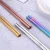 Import O290 Colorful Reusable Portable Antiskid Household Metal Gold Chopsticks Stainless Steel Chopsticks from China