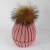 Import real fur pom pom winter hat custom knit hat for woman from China