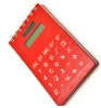 Spiral Notebook covered with Solar calculator in red color
