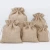 Import Wholesale personalized reusable jute drawstring bag packaging burlap bags with drawstring small muslin custom drawstring bags from China
