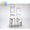 Exquisite Lady Clothes Display Rack Modern Garment Store Metal Clothing Rack With Grid Wall Decoration