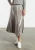 Import HSS3003 OEM service wholesale women clothing metallic pleated skirt latest long skirt design from China