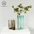 Import Modern simple irregular curved water corrugated amber glass vase flower ware hydroponic blue glass vase from China