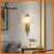 Import Postmodern Iron Fabric Wall lamp For Foyer Bedroom Corridor deco metal strips art modern Hotel LED Lobby Metal tube Wall Light from China