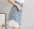 Import Summer lace raw cut skirt A-line half above knee length grind jean girl mini skirt tight crotch over Hip skinny denim skirt from China