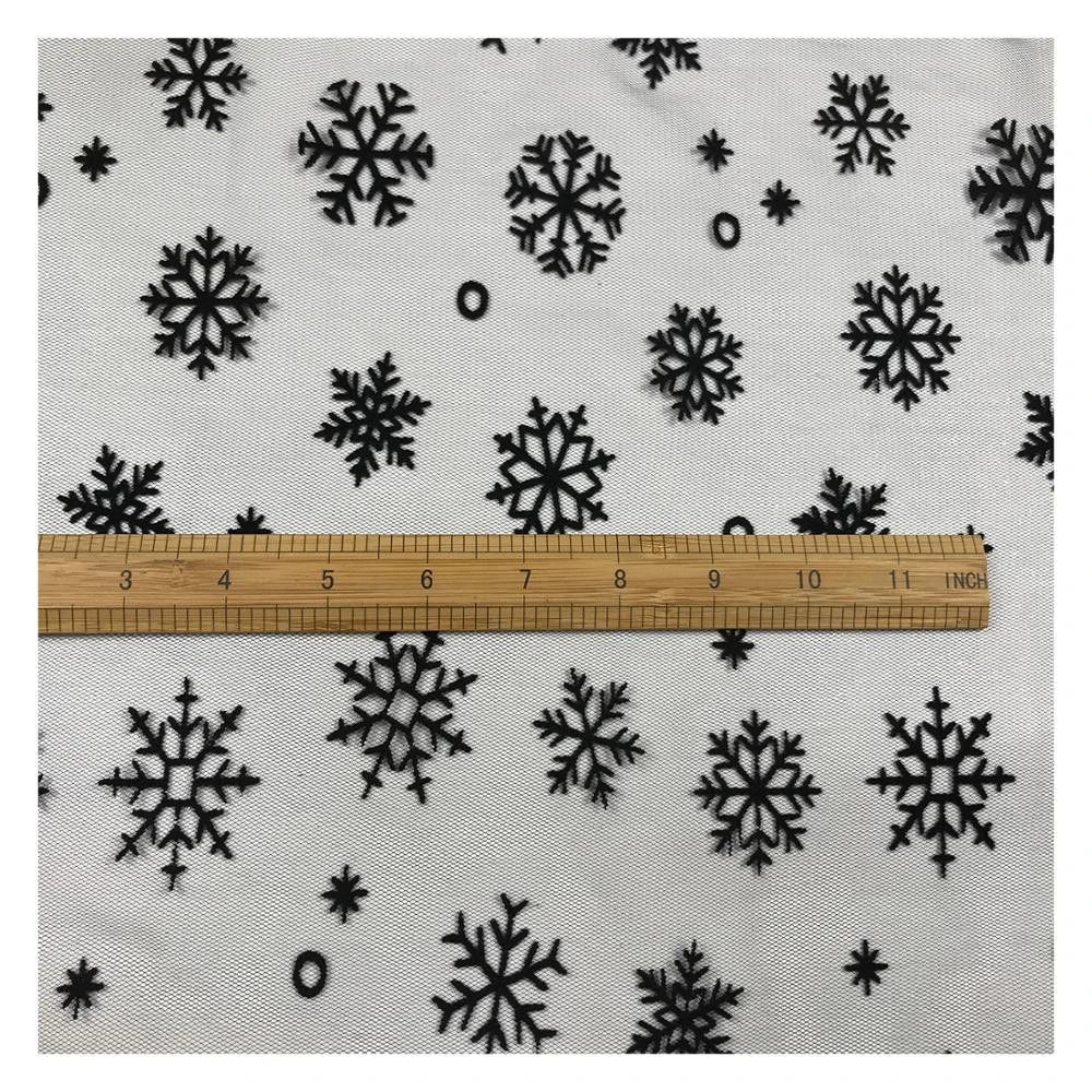 The factory outlet flocking print mesh fabric for christmas garment