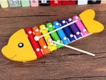 Wooden children's musical instruments and toys