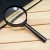 Import Promotion CE &Rosh 60MM 70MM Plastics Hand Magnifier for Kids or elderly Reading Magnifying glasses or Outdoor Playing from China