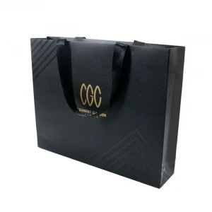 printed black paper bags with Gold Logo and spot UV