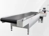 THE MACHINE OF HEMMING BY AUTOMATIC CONVEYOR BELT
