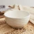 Import 4.5 inch elegant round embossed ceramic white noodle wavy bowl soup bowl rice bowl from China