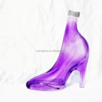 colored and decorated woman body , High-heeled shoes shaped glass wine bottle