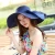 Import New Women Beach Hat Lady Cap Wide Brim Floppy Fold Summer Sun Women Straw Hat from China