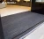 Import Plastic interlocking entrance floor tile price dubai pvc vinyl floor tile from China