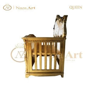 The Queen Baby Crib made from solid mahogany with luxury style  and gold leaf paint