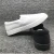 Import Unisex Women Men Plain White Canvas Slip-on Shoes Flat Wholesale from China