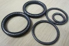 High performance polymer filled PTFE spring energized seal