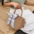 Import 2020 new product Fascinating design Small Round Women Bags Phones And Keys Rope Woven Paper Basket Storage With Bowknot from China