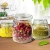 Import 2016 kitchenware glass storage jar with hasp glass lid for coarse cereals from China