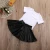 Import 2020 Summer girls clothing white mini t-shirt black pu skirt 2pcs baby girls outfits trendy kids clothing sets from China