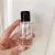 Import 30ml Round cylinder refillable screw neck glass spray perfume bottle perfume from China