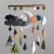 Import Amazon new style ceiling mobile mountain shape wood hanger felt baby mobile from China
