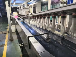 Blue and Black nitrile glove production line making