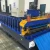 Import building material cold iron steel crimping ribbed roofing sheet Tile Making Machinery roll forming machine from China