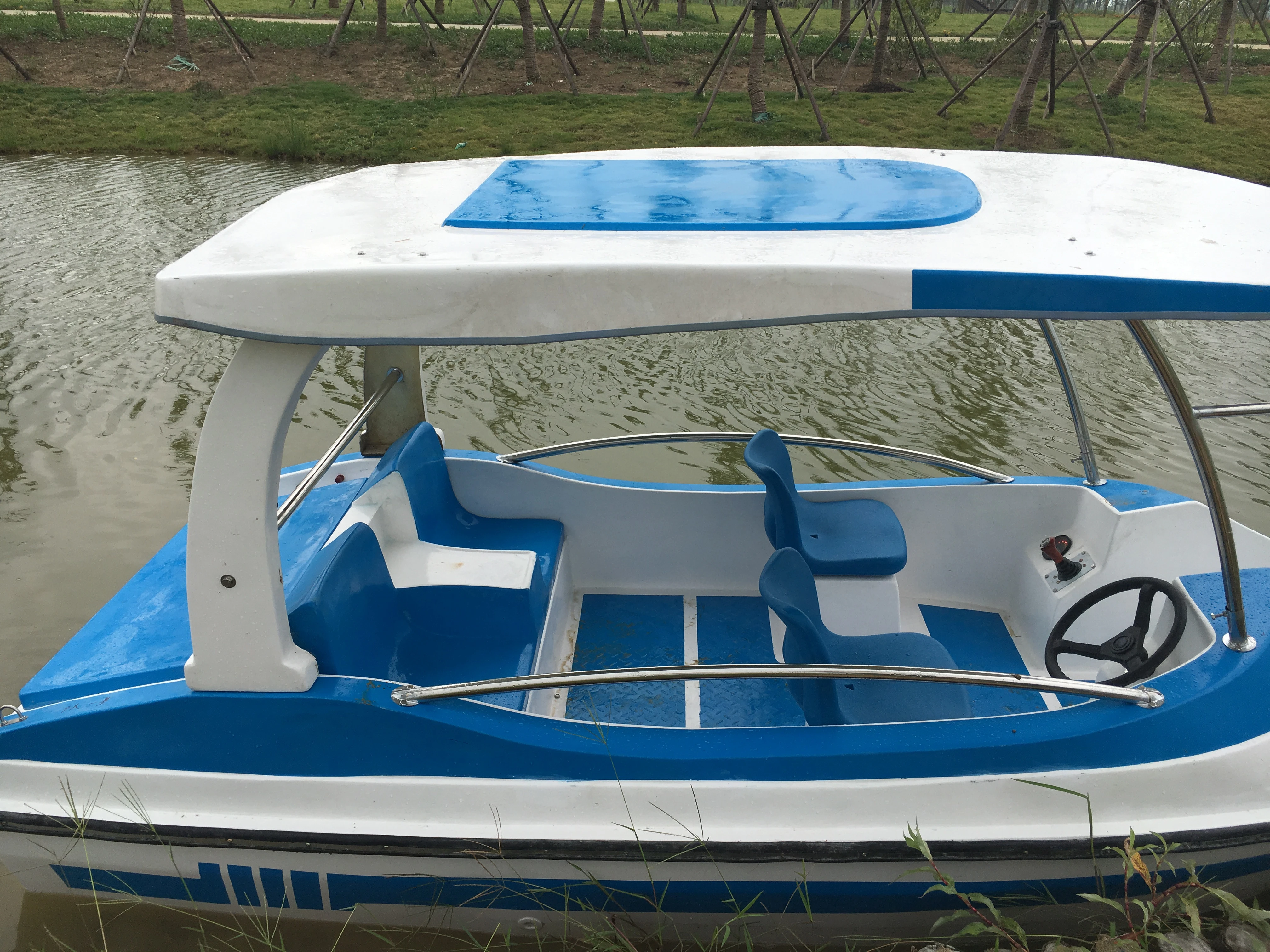 Electric fiberglass water jet boat