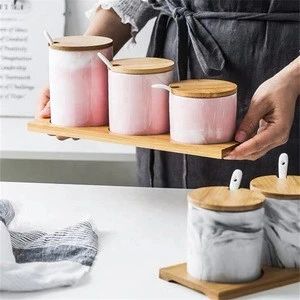 Fancy luxury style wholesale kitchen empty ceramic spice containers marble wooden lid spice jar with bamboo stand