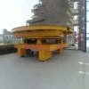 Flat heavy duty motorized handling cart for hauling dies coils and other heavy loads