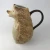 Import hedgehog decorative ceramic water pitcher milk jug with handle from China