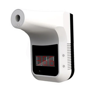 High temperature alarm non contact body thermometer on the wall for office stores public places