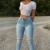 Import NVFelix Top Fashion Women Knitted Stretchy Shredded Denim Pant Manufacturer Ins High Waist Sexy Butt Lifting Ripped Skinny Jeans from China