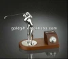 silver golf with wooden base