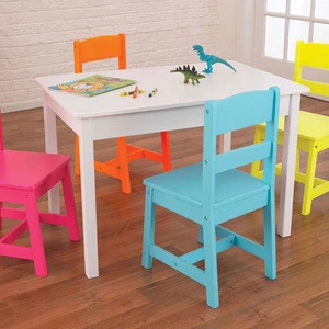 Solid wood post packed kids study table with 4 colorful chairs set