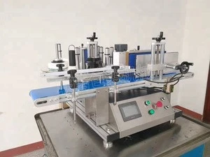 Automatic desktop vertical round bottle labeling machine