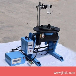 CNC-100 welding positioner with WP200 chuck and torch holder