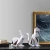 Import Custom Tabletop Ornament Geometric Cartoon Rabbit Statue Cat figurine Craft for Home Decor from China