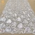 Import embroidery lace fabric knitting silvery sequins tulle lace embroidered tulle lace from China