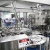 Import Glass Bottle Aluminum Cap Alcoholic Beverage Fillng Machine from China