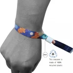 Green RPET personalized VIP wristbands with fun and festive color patterns