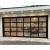 Import Insulated Sectional Aluminum Automatic Modern Black Tempered Tinted Mirror Glass Folding Garage Doors from China