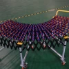 Low Price Mobile Powerless flexible telescopic belt skating conveyor roller system for box