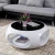 Import Modern home furniture fiberglass hole glass top round shape centre coffee table from China